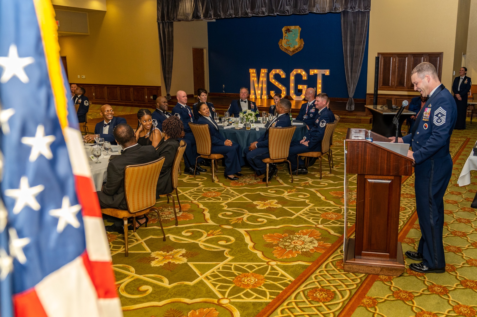U.S. Air Force Chief Master Sgt. Michael Venning, 81st Training Wing command chief, gives his opening remarks during the Senior Noncommissioned Officer Induction Ceremony at Keesler Air Force Base, Mississippi, Oct. 13, 2023.