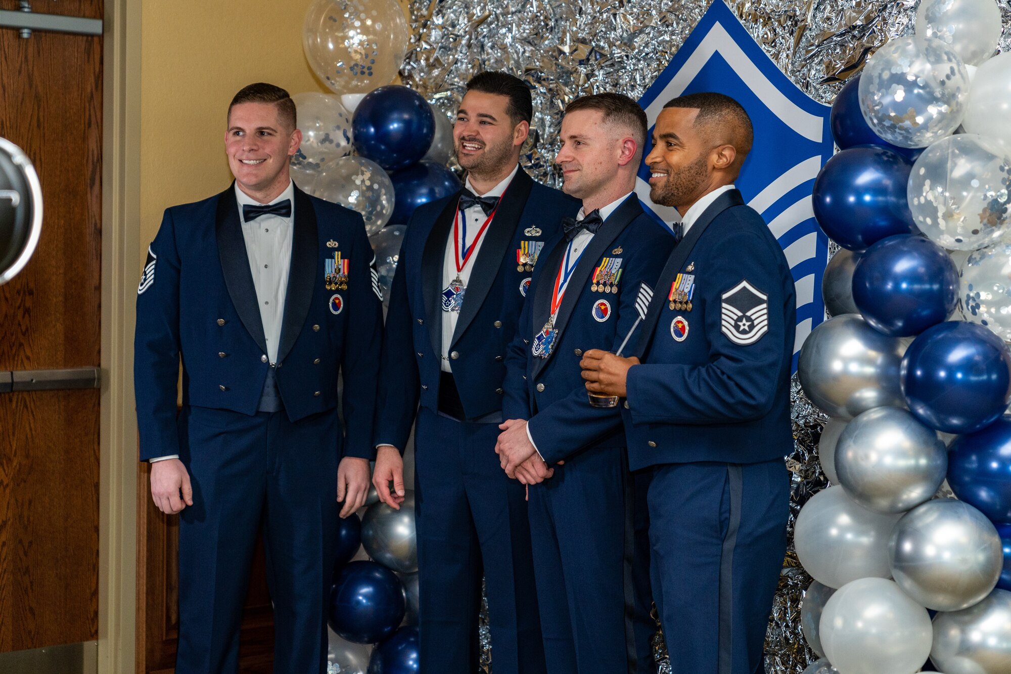 Airmen from the 81st Training Wing pose for a group photo during the Senior Noncommissioned Officer Induction Ceremony at Keesler Air Force Base, Mississippi, Oct. 13, 2023.