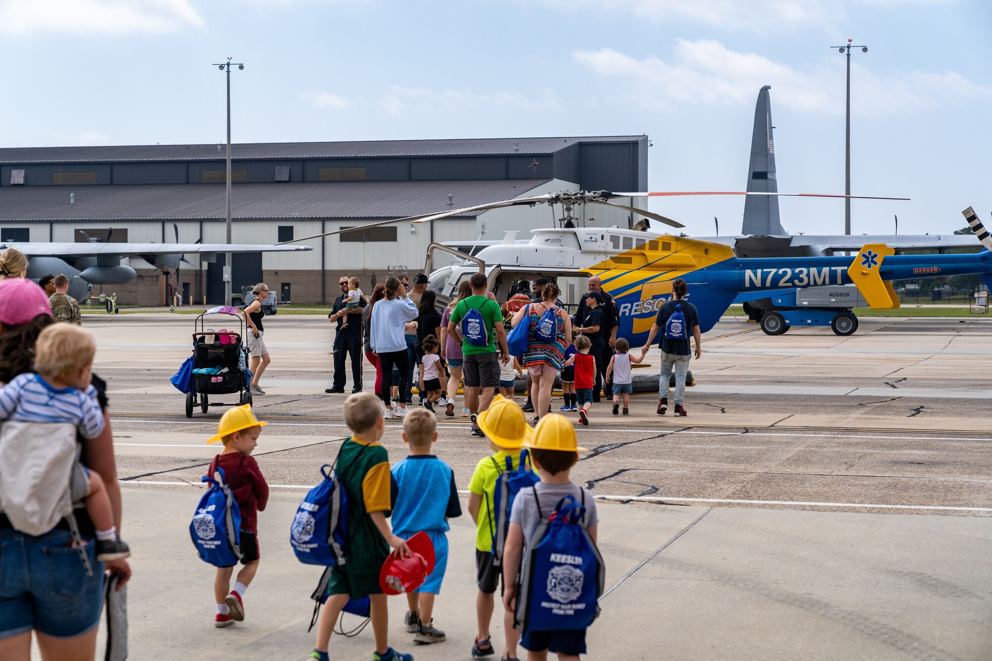 81st Training Wing Airmen, family and friends receive a tour of the FlightCare Rescue 5 air ambulance during the Fire Safety and Preparedness Event at Keesler Air Force Base, Mississippi, Oct. 14, 2023.