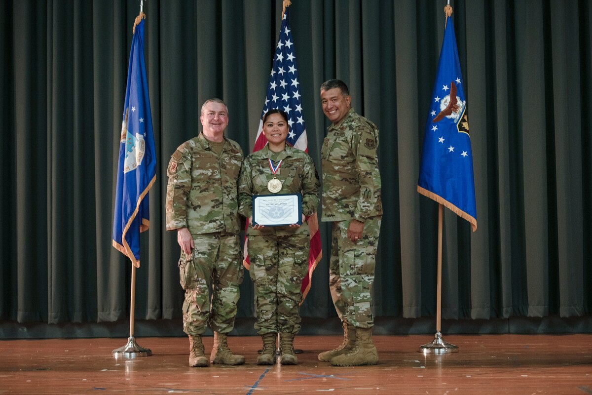 Members of the 349th Air Mobility Wing gathered to celebrate the achievement of it's members who recently achieved the rank of Non-Commissioned Officer or Senior Non-Commissioned Officer.