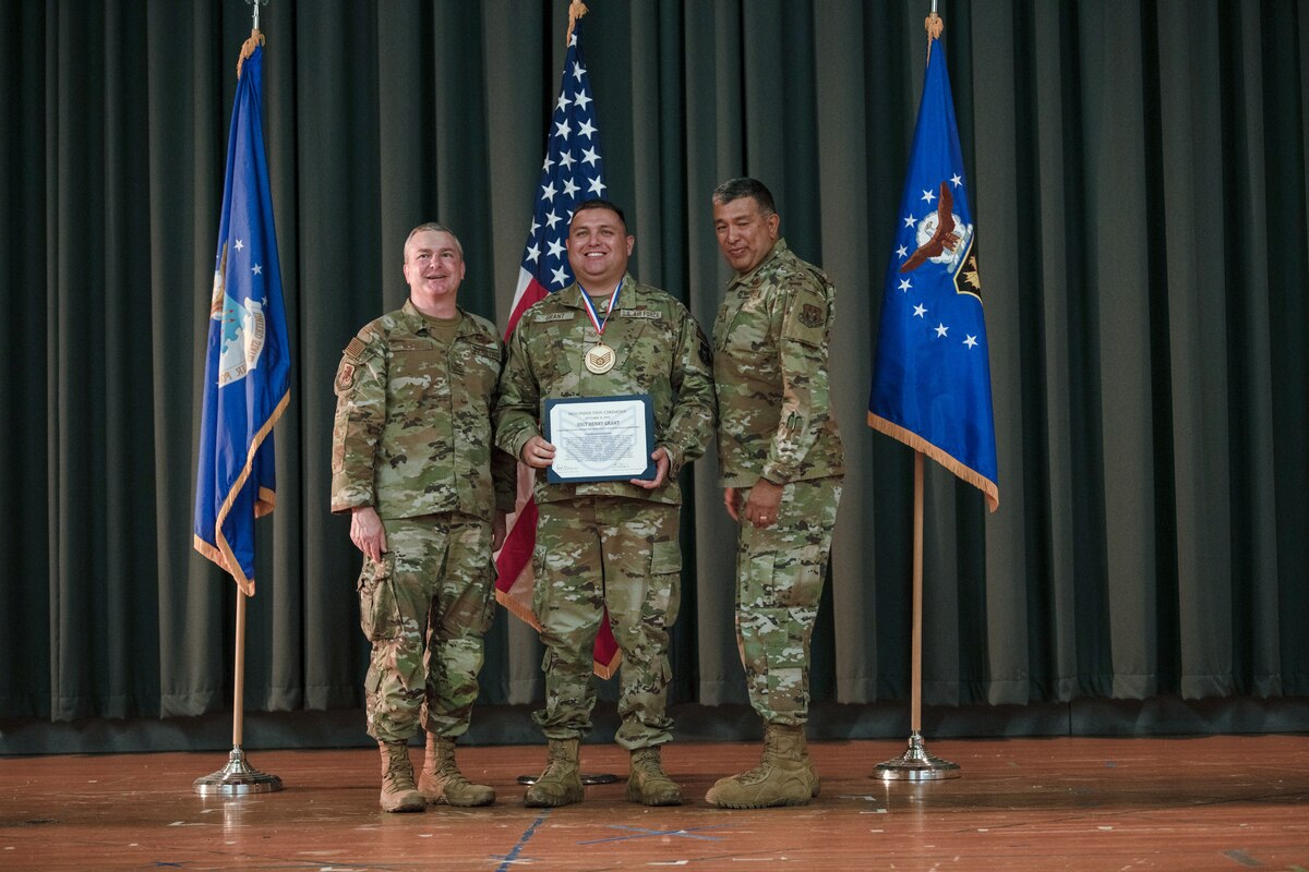 Members of the 349th Air Mobility Wing gathered to celebrate the achievement of it's members who recently achieved the rank of Non-Commissioned Officer or Senior Non-Commissioned Officer.