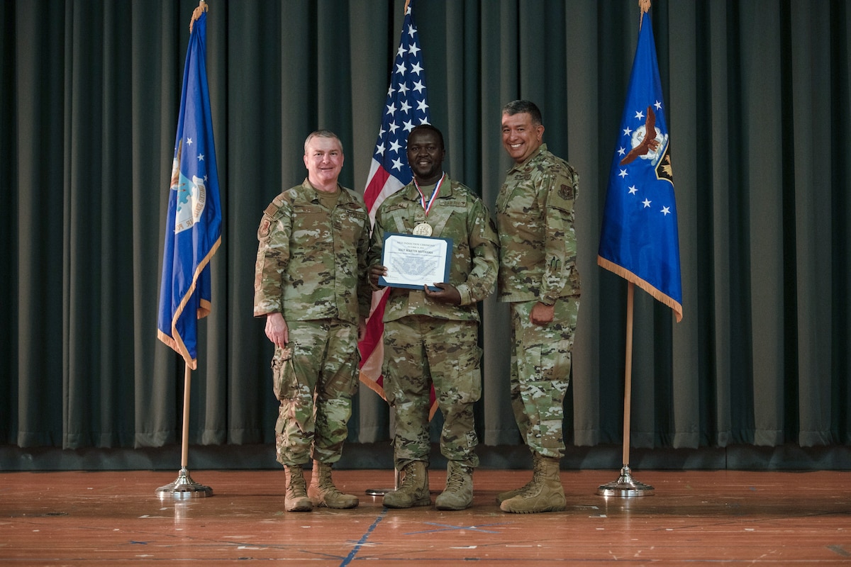 Members of the 349th Air Mobility Wing gathered to celebrate the achievement of it's members who recently achieved the rank of Non-Commissioned Officer or Senior Non-Commissioned Officer.