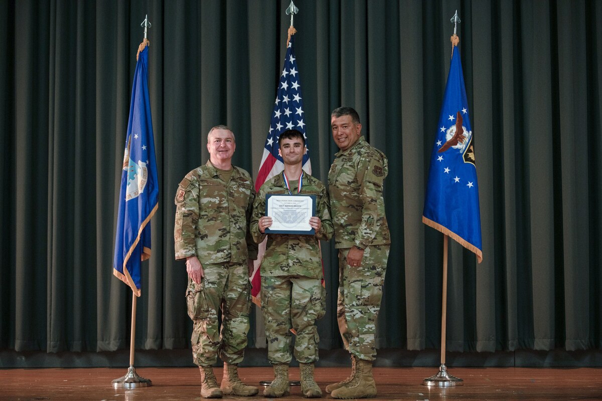 Members of the 349th Air Mobility Wing gathered to celebrate the achievement of it's members who recently achieved the rank of Non-Commissioned Officer or Senior Non-Commissioned Officer.