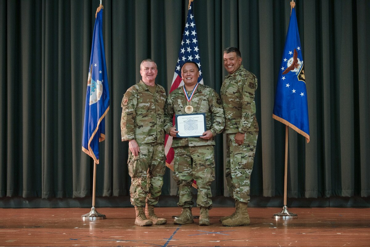 Members of the 349th Air Mobility Wing gathered to celebrate the achievement of it's members who recently achieved the rank of Non-Commissioned Officer or Senior Non-Commissioned Officer.