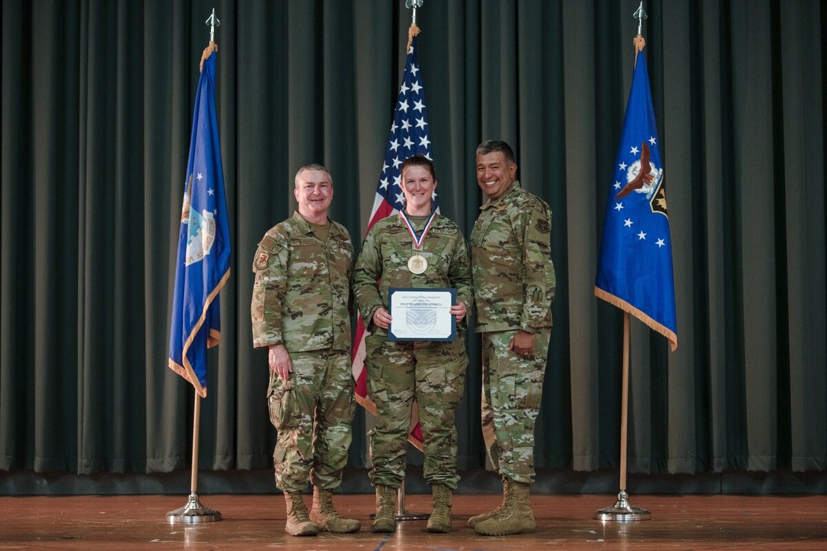 Members of the 349th Air Mobility Wing gathered to celebrate the achievement of it's members who recently achieved the rank of Non-Commissioned Officer or Senior Non-Commissioned Officer.