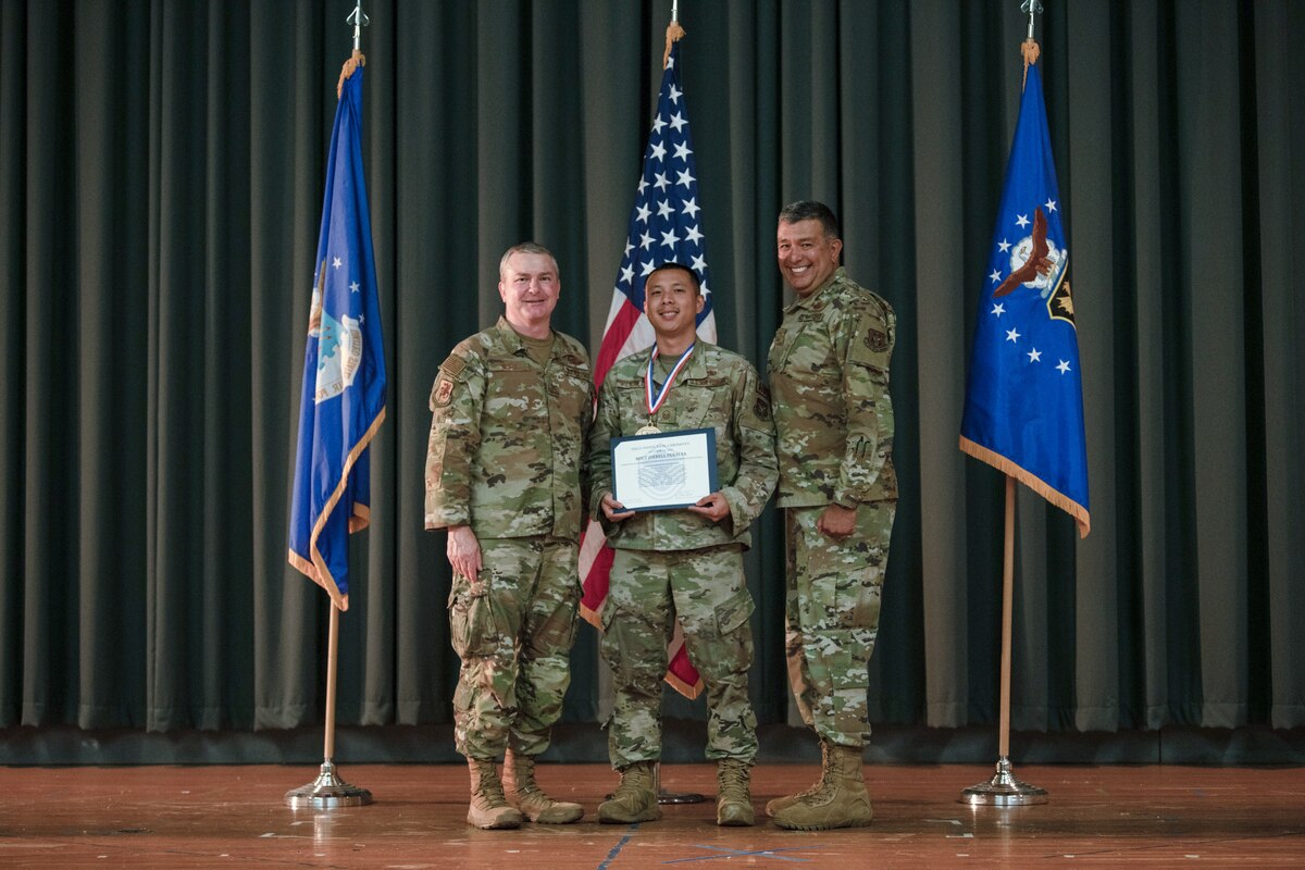 Members of the 349th Air Mobility Wing gathered to celebrate the achievement of it's members who recently achieved the rank of Non-Commissioned Officer or Senior Non-Commissioned Officer.