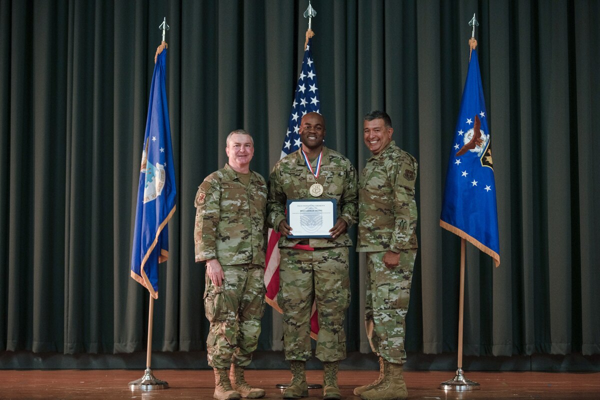 Members of the 349th Air Mobility Wing gathered to celebrate the achievement of it's members who recently achieved the rank of Non-Commissioned Officer or Senior Non-Commissioned Officer.