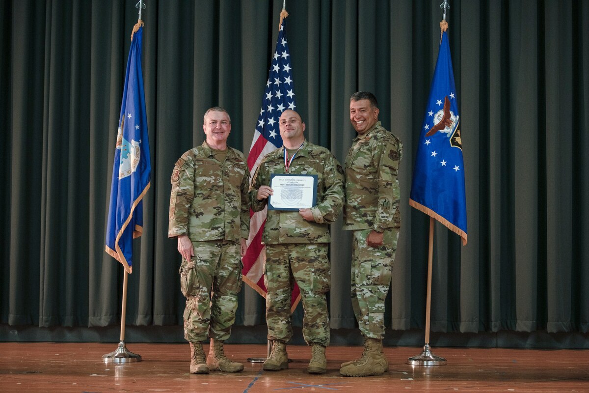 Members of the 349th Air Mobility Wing gathered to celebrate the achievement of it's members who recently achieved the rank of Non-Commissioned Officer or Senior Non-Commissioned Officer.