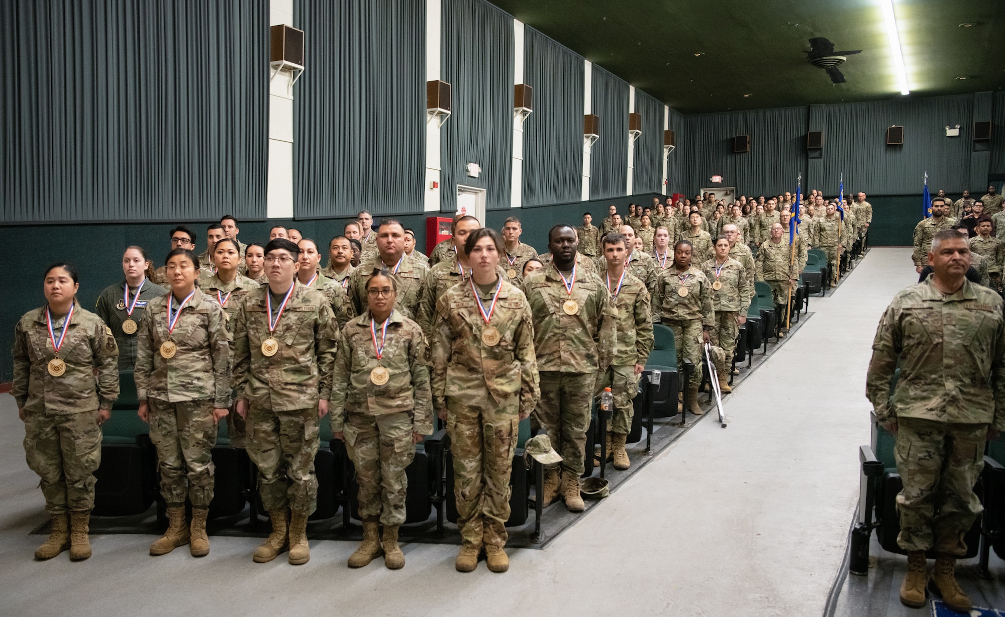 Members of the 349th Air Mobility Wing gathered to celebrate the achievement of many members who had achieved the rank of Non-Commissioned Officer or Senior Non-Commissioned Officer.