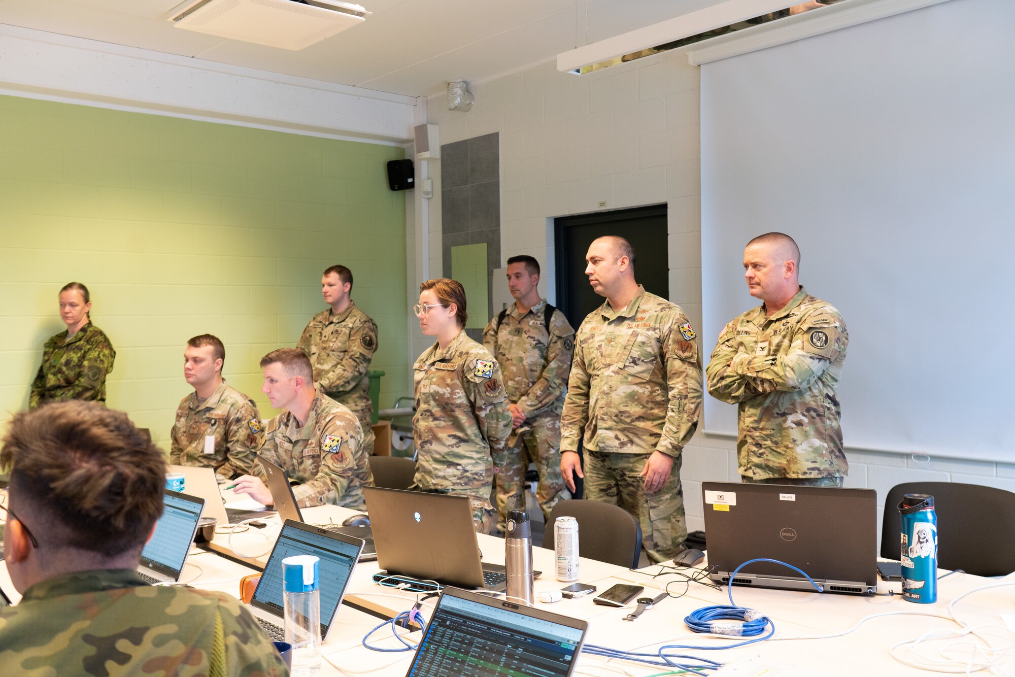 Col. Andrew Collins, commander of the Maryland Army National Guard, and distinguished visitors receive a briefing about Exercise Baltic Blitz 23, a trilateral cyber exercise, on Sept. 19, 2023, at Ämari Air Base, Harijumaa, Estonia.