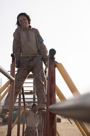 U.S. Marine Corps Recruit Angela Gonzalezlerma with Lima Company, 3rd Recruit Training Battalion, navigates an obstacle during the confidence course at Marine Corps Recruit Depot San Diego, Oct. 16, 2023. Recruits became physically and mentally stronger by overcoming obstacles that require strength, balance, and determination. (U.S. Marine Corps photo by Lance Cpl. Janell B. Alvarez)