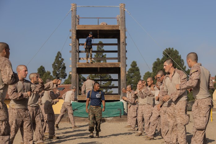 U.S. Marine Corps Sgt. Edrian Zulueta, a drill instructor with Lima Company, 3rd Recruit Training Battalion, supervises recruits during the confidence course at Marine Corps Recruit Depot San Diego, July 17, 2023. Recruits became physically and mentally stronger by overcoming obstacles that require strength, balance, and determination. Zulueta is native of Santa Clara, Calif. (U.S. Marine Corps photo by Lance Cpl. Janell B. Alvarez)