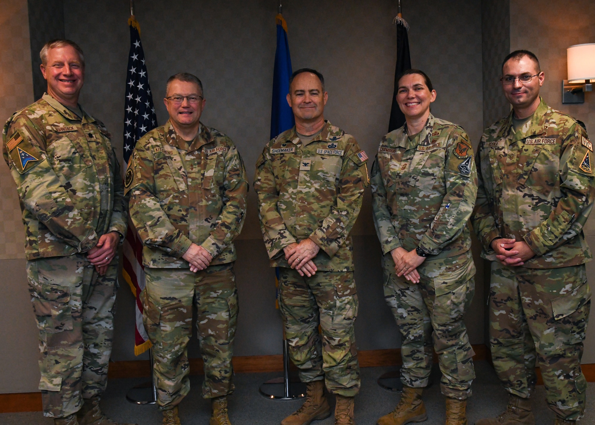 (From left to right) U.S. Air Force Lt. Col. Robert Bohnsack, Space Launch 30 chaplain, Major Gen. Randall Kitchens, Department of the Air Force chief of chaplains, U.S. Space Force Col. Mark Shoemaker, SLD 30 commander, U.S. Air Force Command Chief Master Sgt. Sadie Chambers, DAF Religious Affairs senior enlisted leader, Master Sgt. Jonathan Sogka, SLD 30 Religious Affairs superintendent, pose for a photo at Vandenberg Space Force Base, Calif., Sept. 20, 2023.