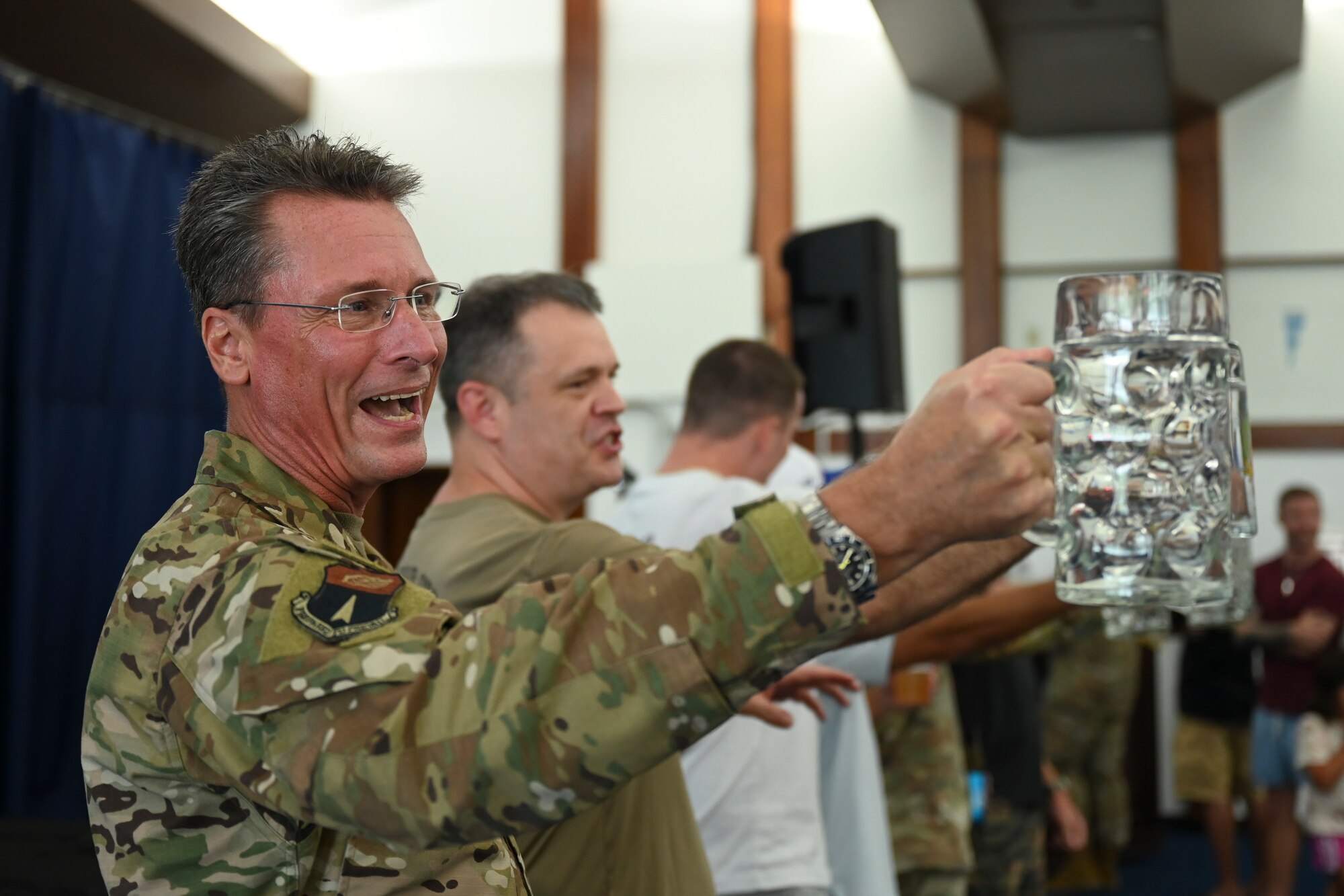 Brig. Gen. Thomas Palenske, 36th Wing commander, participates in a competition during the 36th Wing First Friday Oktoberfest event at Andersen Air Force Base, Guam, Oct. 6, 2023.