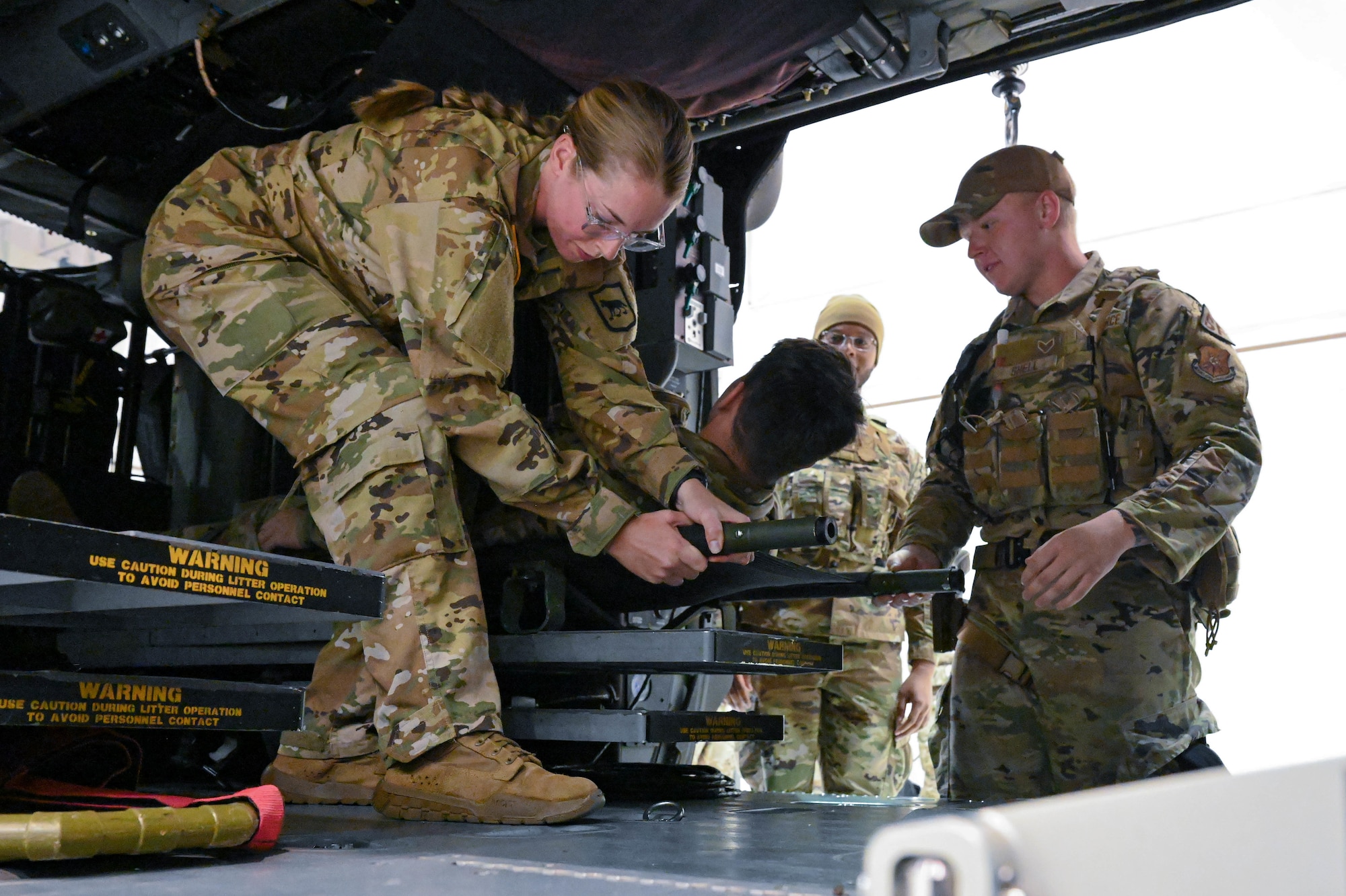 Ellsworth Airmen train with Local Army National Guard on helicopter medical evacuation procedures
