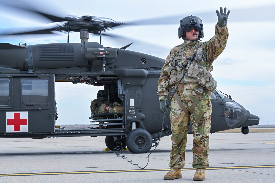 Ellsworth Airmen train with Local Army National Guard on helicopter medical evacuation procedures