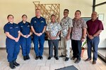 Capt. Nicholas Simmons, commander of U.S. Coast Guard Forces Micronesia/Sector Guam (CGFM/SG), and members of the CGFM/SG Compact of Free Association team stand for a photo with members of the RMI Trust Company on Sept. 20, 2023. The Trust Company is responsible for maintaining the flag registry of commercial vessels, one of the leading registries in the world.  Simmons led a delegation to the Republic of the Marshall Islands (RMI), one of the three former U.S. trust territories under the Compact of Free Association. The visit underscores CGFM/SG's strengthened role as the primary facilitator of the cooperative relationship between the U.S. Coast Guard and the RMI, reinforcing longstanding ties. (U.S. Coast Guard photo)