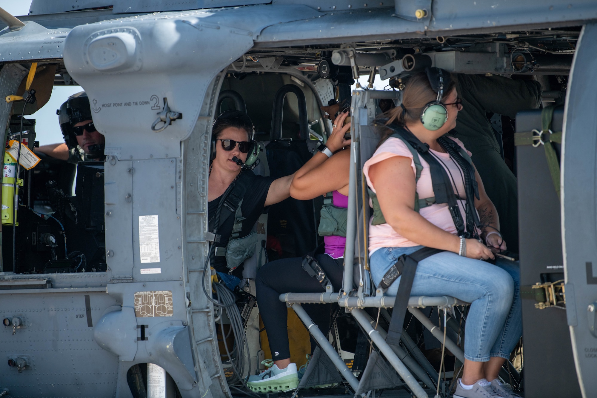 Kadena spouses sit in helicopter
