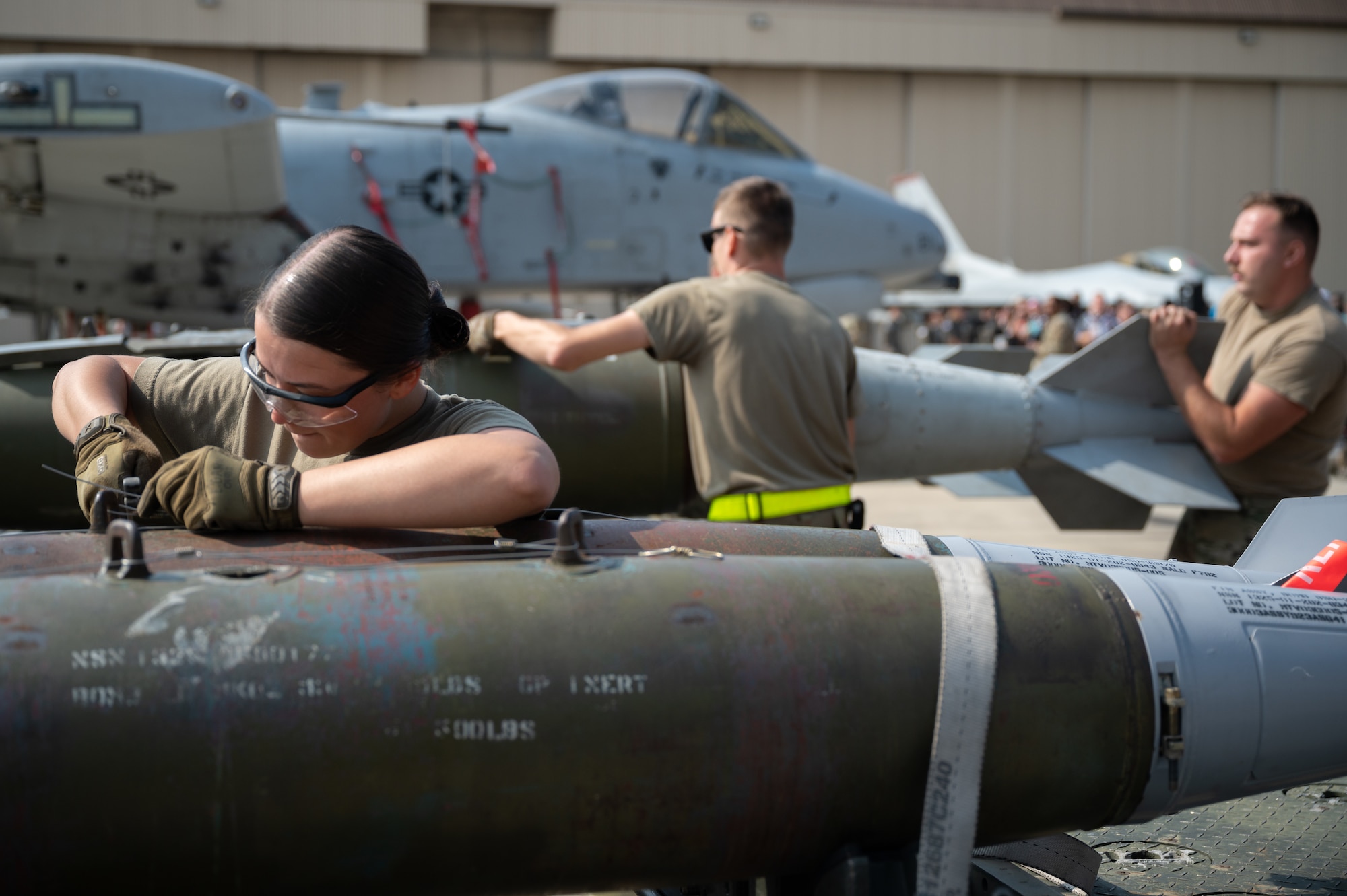 A munitions systems specialist, prepares a munition during Pen Fest, the annual bilateral munitions load crew competition at Kunsan Air Base