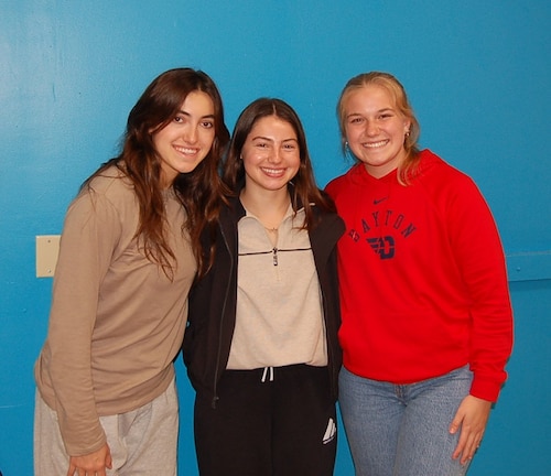 From left: University of Dayton, or UD, undergraduate students and 2023-2024 Stitt Scholars Avery Baltrus, Anna Carollo and Raegan Rowland pose for a photo outside of their design lab on campus in Dayton, Ohio, Oct. 9, 2023. Stitt Scholars, all of whom are multidisciplinary students based in UD’s School of Engineering, School of Business Administration or College of Arts and Sciences, complete a paid internship experience spanning one full academic year that is typically tied to a local technology-based or -enabled entrepreneurial effort. This year, Baltrus, Carollo and Rowland selected the rollout of Educational ARES OS software, hardware and curriculum solutions into local schools for free or low-cost as their internship focus. (Courtesy photo / Michael Moulton)