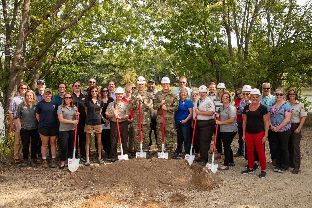 The 55th Chief of Engineers and Commanding General of the U.S. Army Corps of Engineers, Lt. Gen. Scott A. Spellmon, stands with Deputy Commander of the USACE Rock Island District, Maj. Matthew Fletcher, Upper Mississippi River National Wildlife and Fish Refuge Manager, Sabrina Chandler, from the U.S. Fish and Wildlife Service, and other members of the Steamboat Island project team after breaking ground on the project.