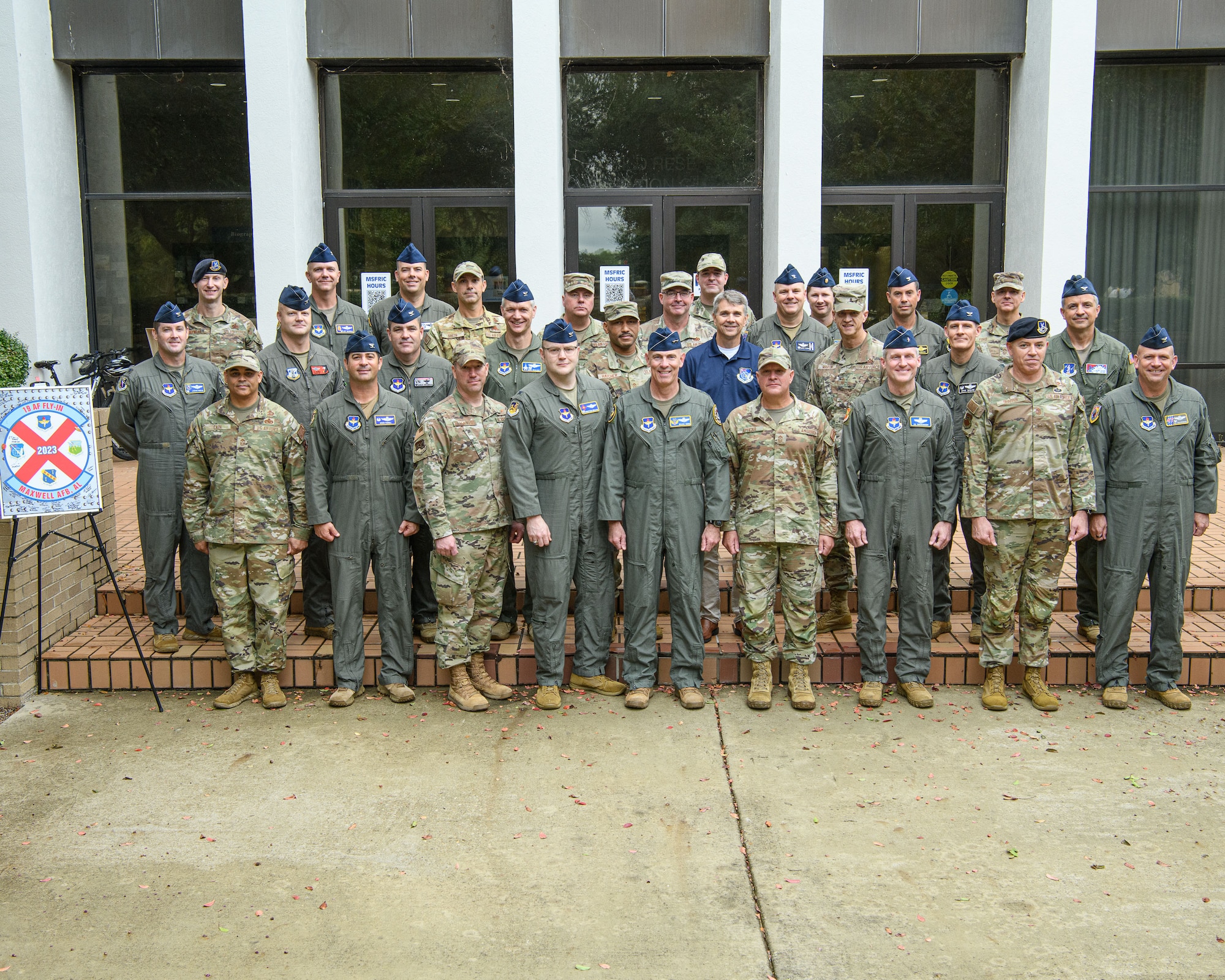Military members taking a group photo for 19th AF fly-in