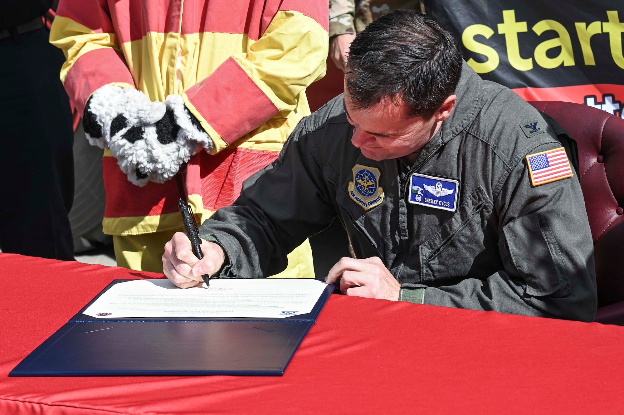 Col. Dycus signs the fire proclamation