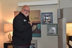 Paul R. Jones, the Chief for Inpatient Medical Social Work at Walter Reed National Military Medical Center proudly displays the medals his father earned during World War II, and a photo of his beloved mother, Willena.