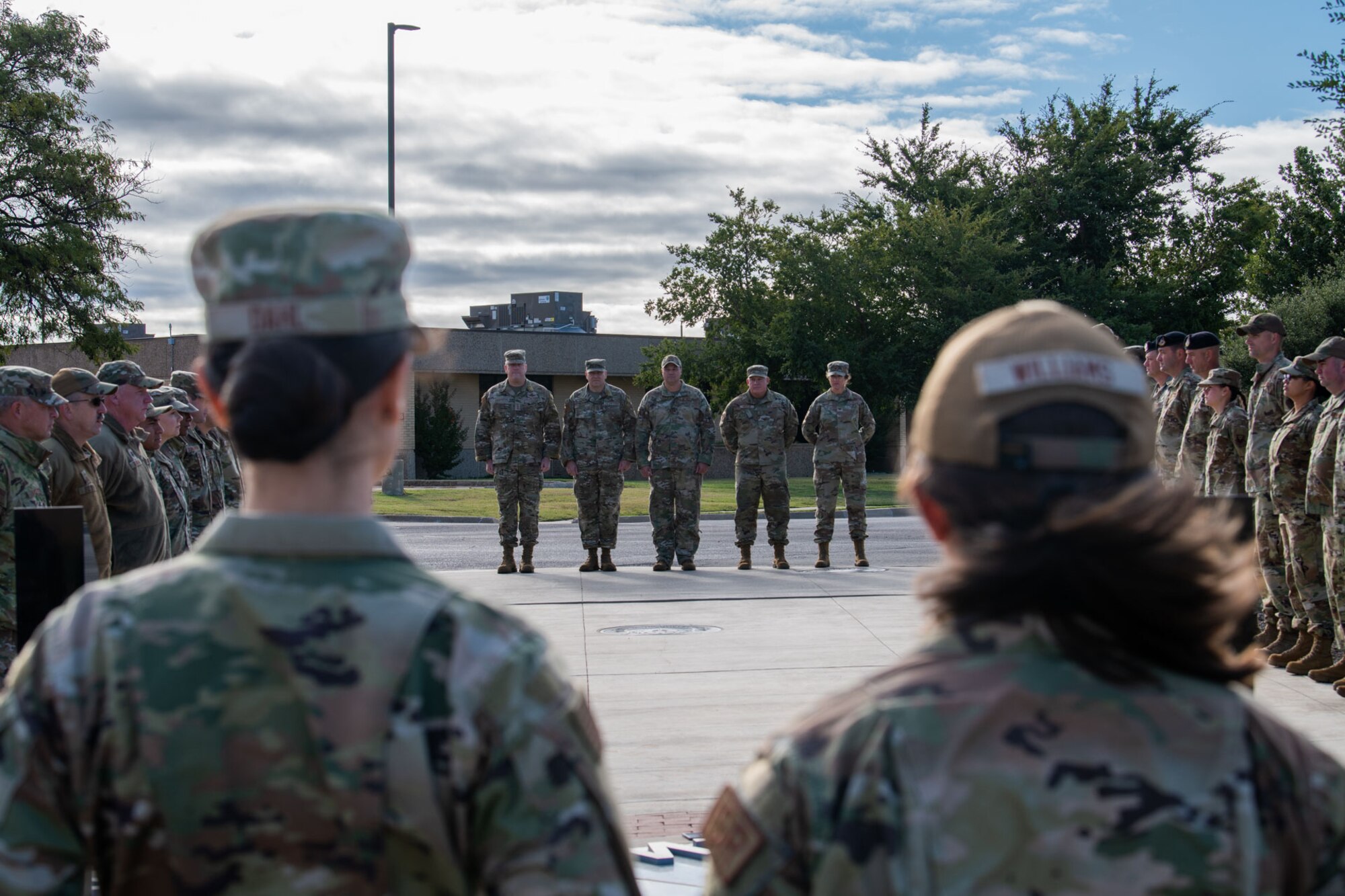 a group of Airmen stand in formation
