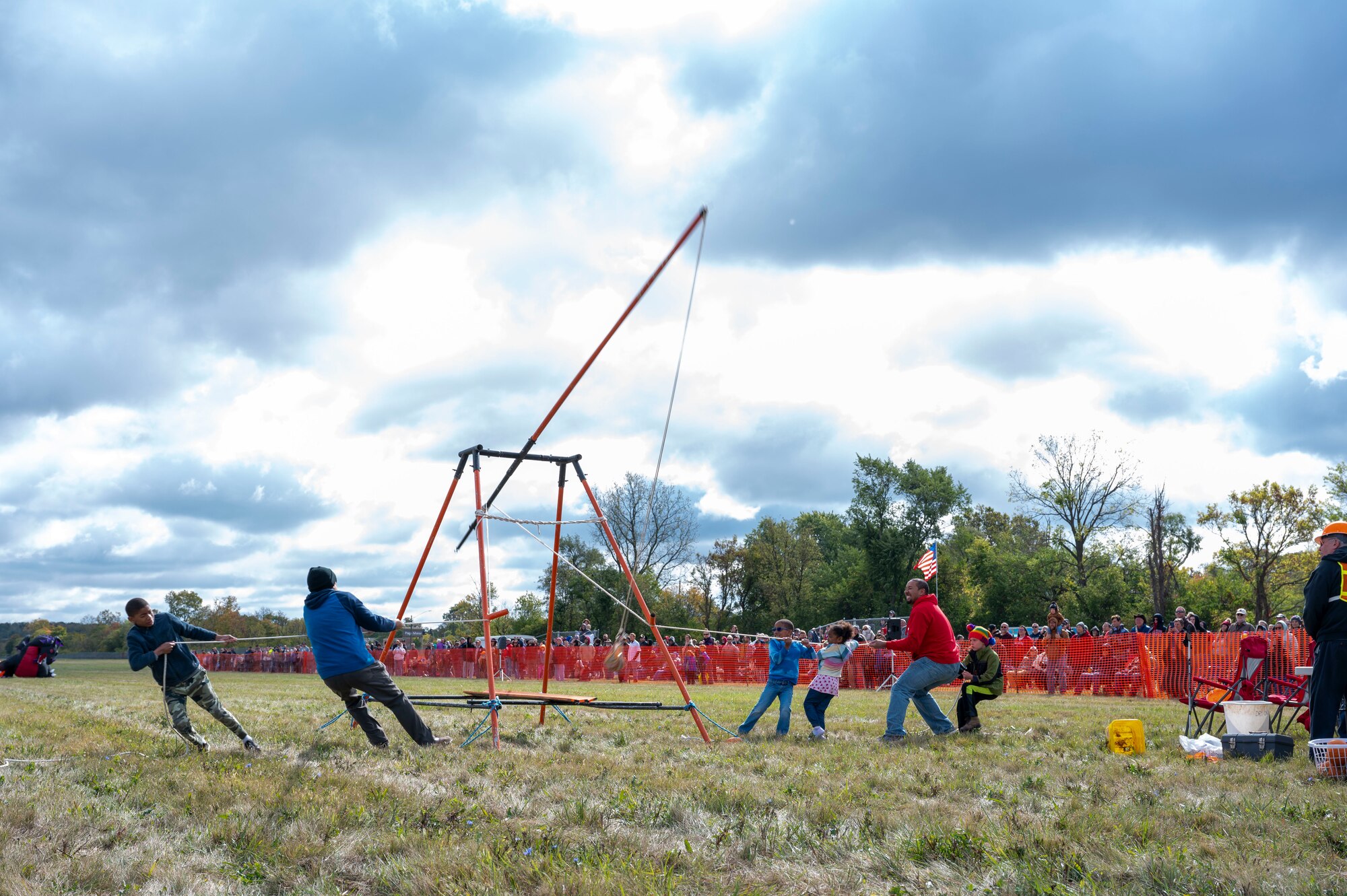 Local community members pull the rope on a human-powered pumpkin chucker during the 18th annual Pumpkin Chuck competition on National Museum of the U.S. Air Force grounds at Wright-Patterson Air Force Base, Ohio, Oct. 7, 2023. The Class C machines are human-powered, and teams could sign up on site to compete on the novice-friendly version. (U.S. Air Force photo by Staff Sgt. Mikaley Kline)