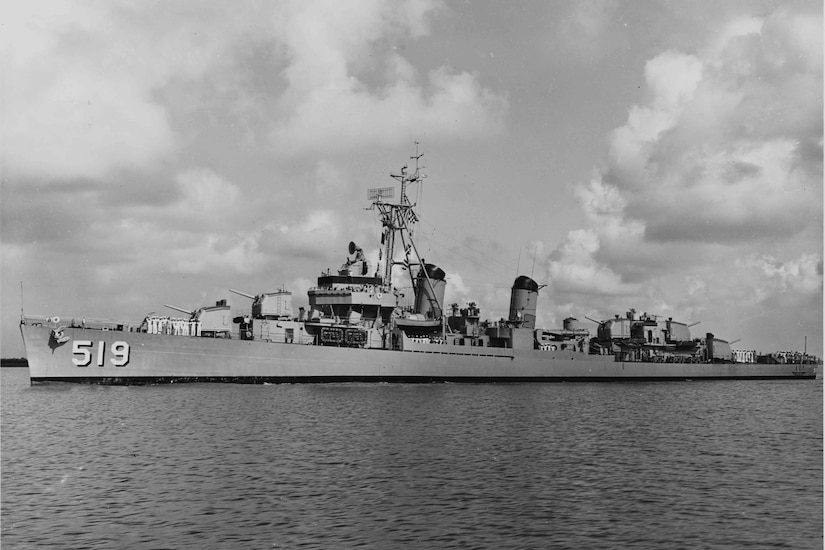 A large ship sits in the water.