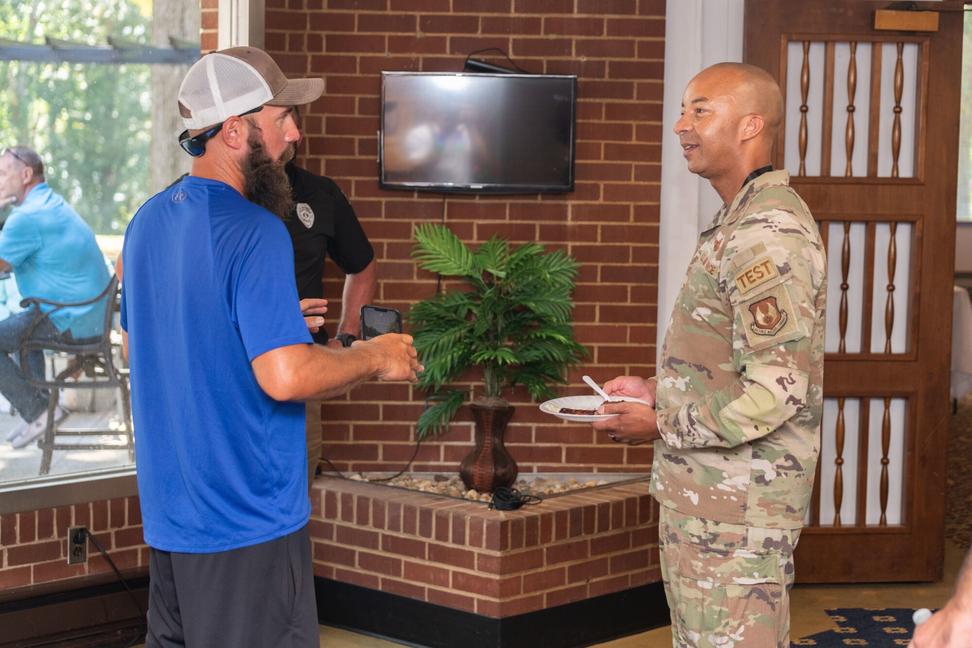 Noah Coughlan, founder of Run4Revival, meets with Col. Randel Gordon, commander of Arnold Engineering Development Complex, Oct. 3, 2023, during the Veterans Appreciation Picnic event at the Arnold Lakeside Complex on Arnold Air Force Base, Tenn. Run4Revival is a coast-to-coast solo run Coughlan undertook earlier this year to pay tribute to American soldiers and their families. He departed from Blaine, Wash., located near the Canadian border on May 29 to coincide with Memorial Day. He intends to conclude his 3,500-mile journey in the Miami-Fort Lauderdale, Fla., area on Nov. 11 to coincide with Veterans Day. Coughlan stopped by Arnold during his run to meet with base personnel. (U.S. Air Force photo by Keith Thornburgh)