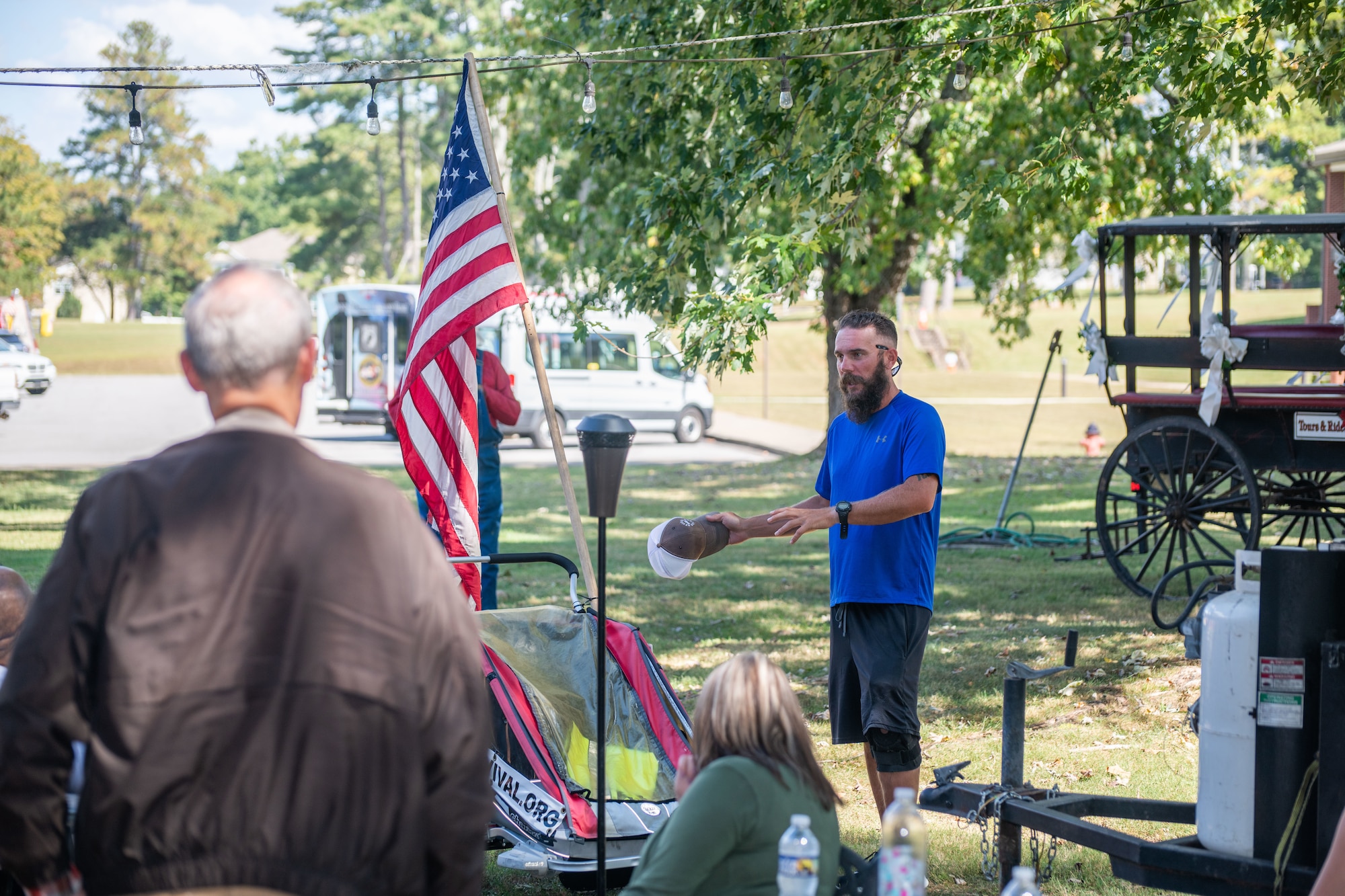Noah Coughlan, founder of Run4Revival, speaks with attendees of the Veterans Appreciation Picnic event Oct. 3, 2023, at the Arnold Lakeside Complex on Arnold Air Force Base, Tenn. Run4Revival is a coast-to-coast solo run Coughlan undertook earlier this year to pay tribute to American soldiers and their families. He departed from Blaine, Wash., located near the Canadian border on May 29 to coincide with Memorial Day. He intends to conclude his 3,500-mile journey in the Miami-Fort Lauderdale, Fla., area on Nov. 11 to coincide with Veterans Day. Coughlan stopped by Arnold during his run to meet with base personnel. (U.S. Air Force photo by Keith Thornburgh)