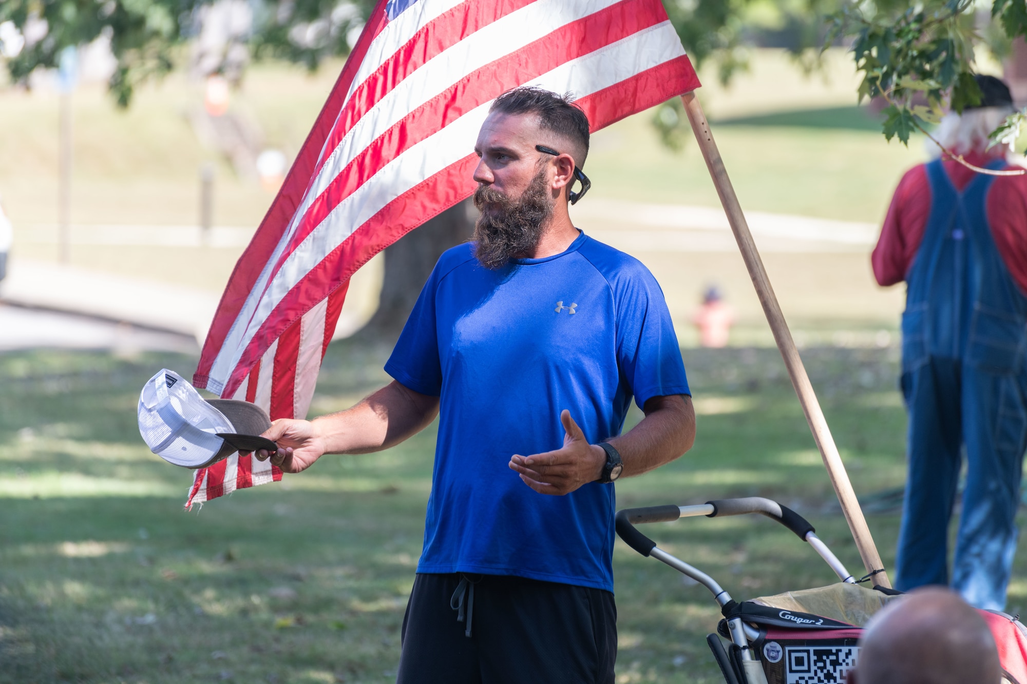 Noah Coughlan, founder of Run4Revival, speaks with attendees of the Veterans Appreciation Picnic event Oct. 3, 2023, at the Arnold Lakeside Complex on Arnold Air Force Base, Tenn. Run4Revival is a coast-to-coast solo run Coughlan undertook earlier this year to pay tribute to American soldiers and their families. He departed from Blaine, Wash., located near the Canadian border on May 29 to coincide with Memorial Day. He intends to conclude his 3,500-mile journey in the Miami-Fort Lauderdale, Fla., area on Nov. 11 to coincide with Veterans Day. Coughlan stopped by Arnold during his run to meet with base personnel. (U.S. Air Force photo by Keith Thornburgh)