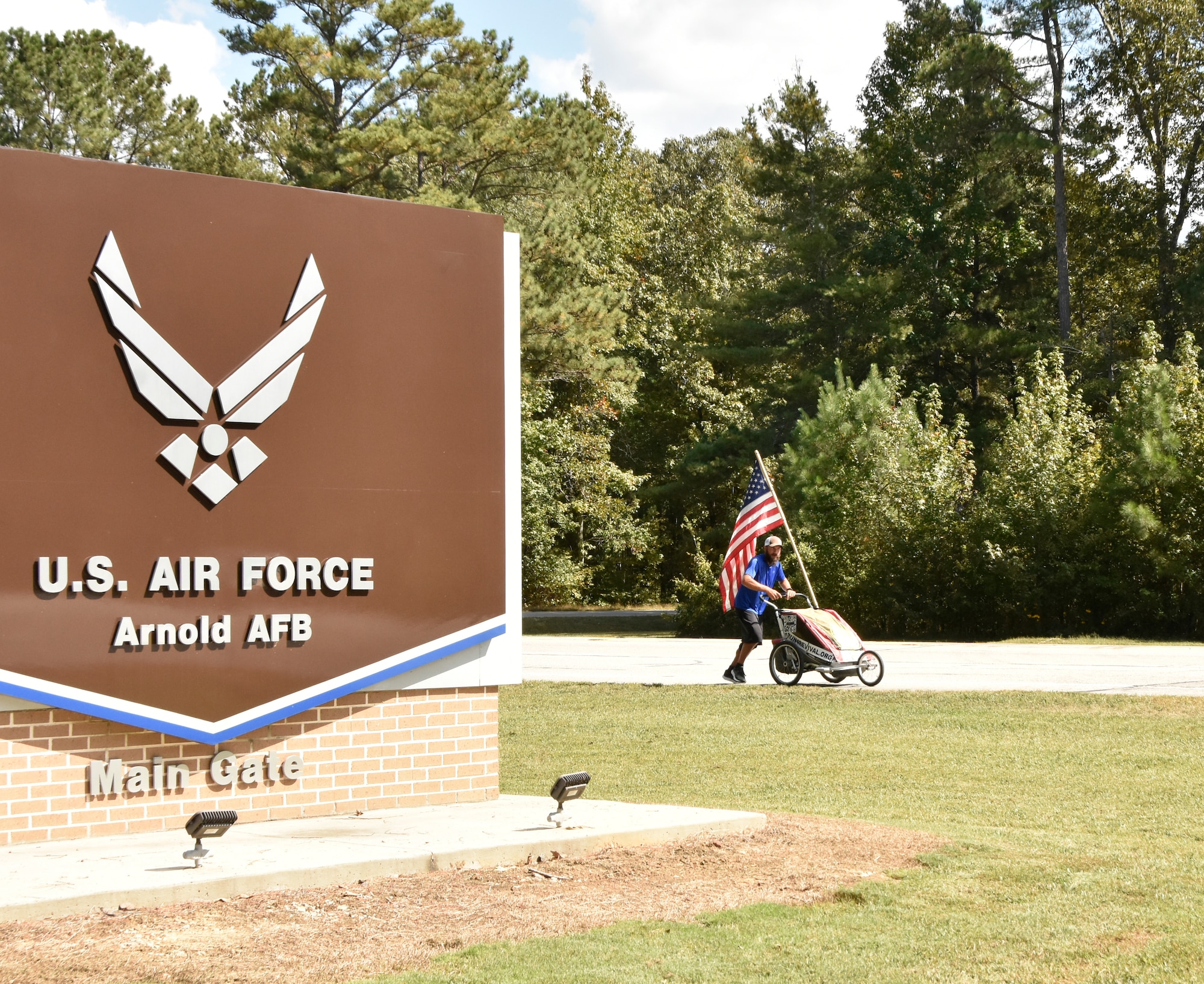 Noah Coughlan, founder of Run4Revival, approaches the Visitors’ Control Center at Arnold Air Force Base, Tenn., Oct. 3, 2023. Run4Revival is a coast-to-coast solo run Coughlan undertook earlier this year to pay tribute to American soldiers and their families. He departed from Blaine, Wash., located near the Canadian border on May 29 to coincide with Memorial Day. He intends to conclude his 3,500-mile journey in the Miami-Fort Lauderdale, Fla., area on Nov. 11 to coincide with Veterans Day. (U.S. Air Force photo by Bradley Hicks)
