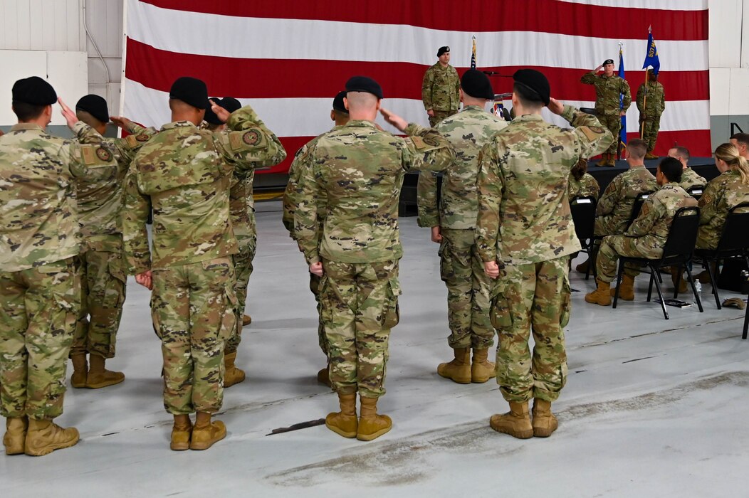 group saluting a person