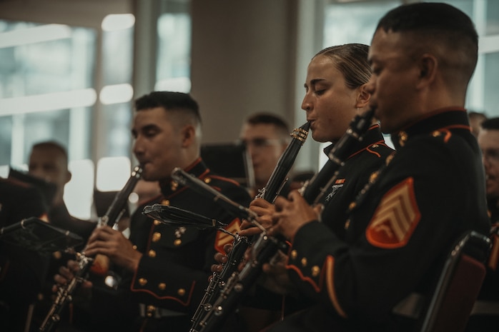 U.S. Marine Corps Cpl. Madison Grimsbo, a musician with Marine Band San Diego, plays a clarinet during a performance during the 130th International Chiefs of Police Convention at the San Diego Convention Center Oct. 14, 2023. The Marine Band San Diego performed before the convention started, which consisted of law enforcement professionals gathering to advance their knowledge within the career field. (U.S. Marine Corps photo by Lance Cpl. Francisco Angel)