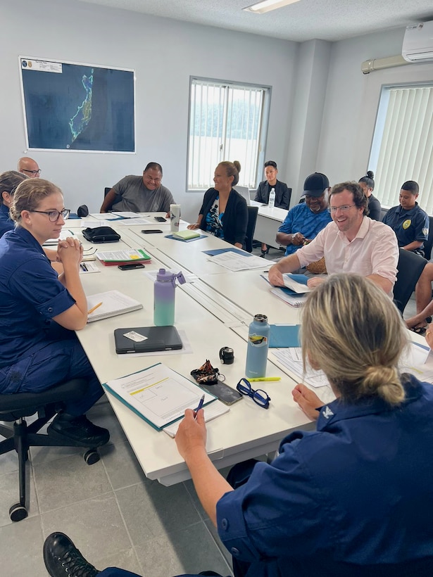Representatives of the U.S. Coast Guard and the Republic of Palau conduct a tabletop exercise discussion and forms review for enacting the enhanced bilateral agreement in Palau in early October 2023. Following the signing of an expanded bilateral law enforcement agreement in August, during the Joint Heads of Pacific Security conference, representatives of the U.S. Coast Guard and the Republic of Palau embarked on a series of meetings and initiatives to advance maritime partnership and promote regional stability. (U.S. Coast Guard photo)