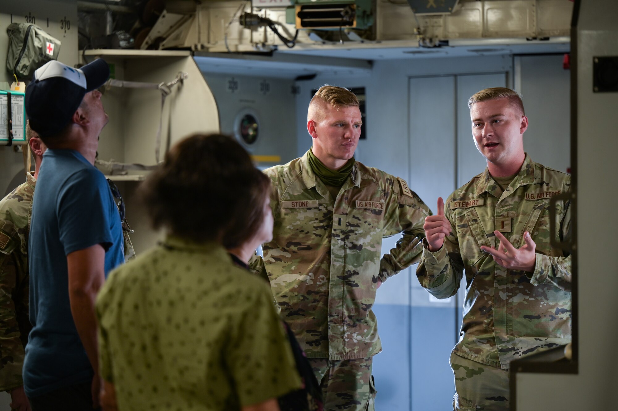 Second Lt. Jeffrey Stewart, 15th Maintenance Squadron fabrications flight commander, speaks to members assigned to the 647th Logistics Readiness Squadron during a maintenance immersion tour at Joint Base Pearl Harbor-Hickam, Hawaii, Oct. 18, 2023. Stewart led the tour, familiarizing 647th LRS personnel with a C-17 Globemaster III and the impact their squadron has on other units across the 15th Wing. (U.S. Air Force photo by Staff Sgt. Alan Ricker)