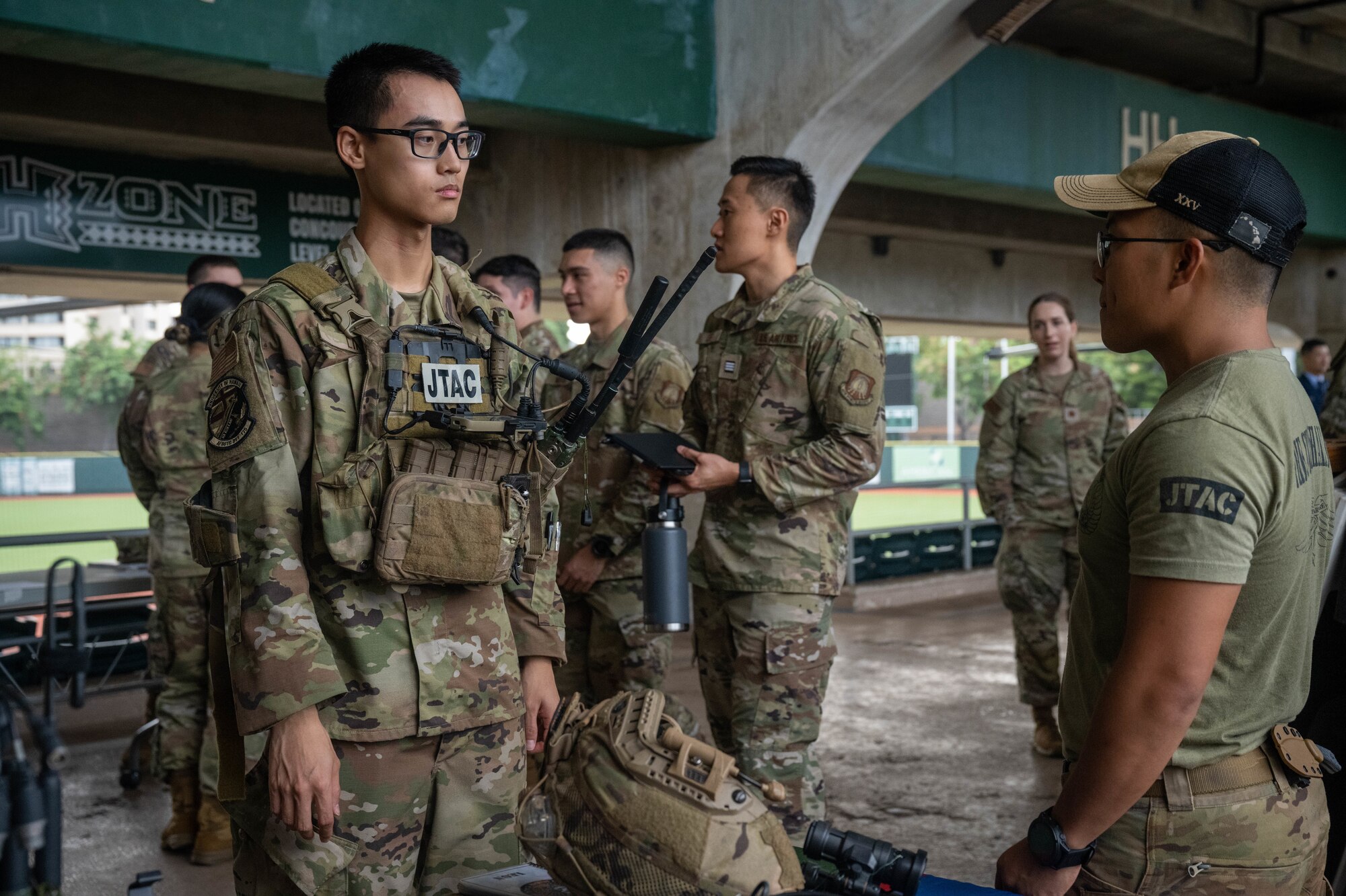 Air Force Reserve Officer Training Corps cadets assigned to Detachment 175 speak to an officer from the 25th Air Support Operations Squadron during a career day at the University of Hawaii at Manoa, Oct. 13, 2023. Officers from more than nine career fields visited the cadets to educate them about the diverse opportunities and missions within the Air Force.  (U.S. Air Force photo by Senior Airman Makensie Cooper)