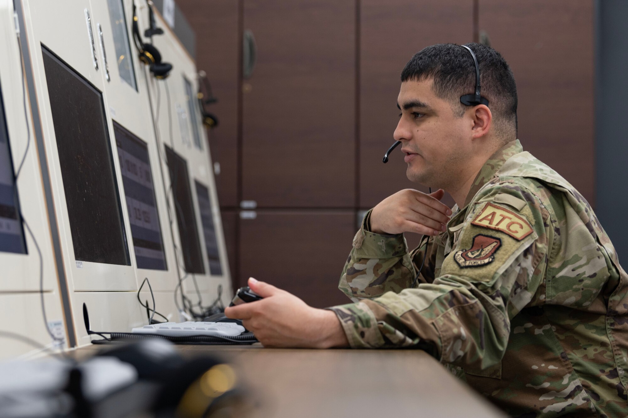 U.S. Air Force Staff Sgt. Javier Gonzalez, 51st Operations Support Squadron radar approach control air traffic watch supervisor, practices on a radar virtual simulation at the Republic of Korea Air Force Education and Training Command, Jinju, Republic of Korea, Oct. 12, 2023. Gonzalez recently won an air traffic control competition hosted by ROKAF and was invited back to demonstrate his skills to U.S. and ROK leadership. The intent was for ROKAF to record the similarities and differences between their techniques of aircraft movement and the USAF and to improve friendships and international relations. (U.S. Air Force photo by Staff Sgt. Aubree Owens)