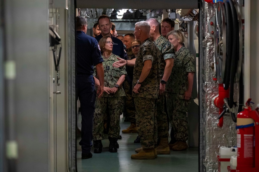 ATLANTIC OCEAN (Oct. 18, 2023) – Vice Chief of Naval Operations Adm. Lisa Franchetti, Commandant of the Marine Corps Gen. Eric Smith, and Royal Navy First Sea Lord and Chief of Naval Staff Adm. Sir Ben Key tour the HMS Prince of Wales (R09), Oct. 18. While aboard, Franchetti, Smith and Key signed the Delivering Combined Seapower (DCS) charter, which is intended to achieve the Service Chiefs’ combined vision for US-UK interoperability moving toward interchangeability. (U.S. Navy photo by Chief Mass Communication Specialist Amanda R. Gray)