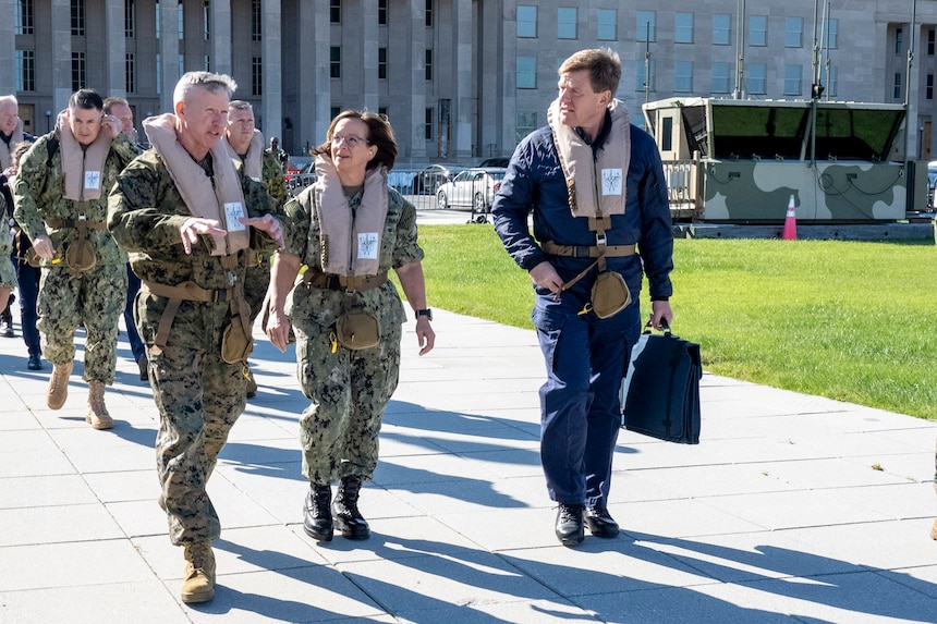 WASHINGTON (Oct. 18, 2023) – Vice Chief of Naval Operations Adm. Lisa Franchetti, Commandant of the Marine Corps Gen. Eric Smith, and Royal Navy First Sea Lord and Chief of Naval Staff Adm. Sir Ben Key, board a Marine Corps MV-22 Osprey to transit to the deployed HMS Prince of Wales (R09), Oct. 18. While aboard HMS Prince of Wales, Franchetti, Smith and Key signed the Delivering Combined Seapower (DCS) charter, which is intended to achieve the Service Chiefs’ combined vision for US-UK interoperability moving toward interchangeability. (U.S. Navy photo by Chief Mass Communication Specialist Amanda R. Gray)
