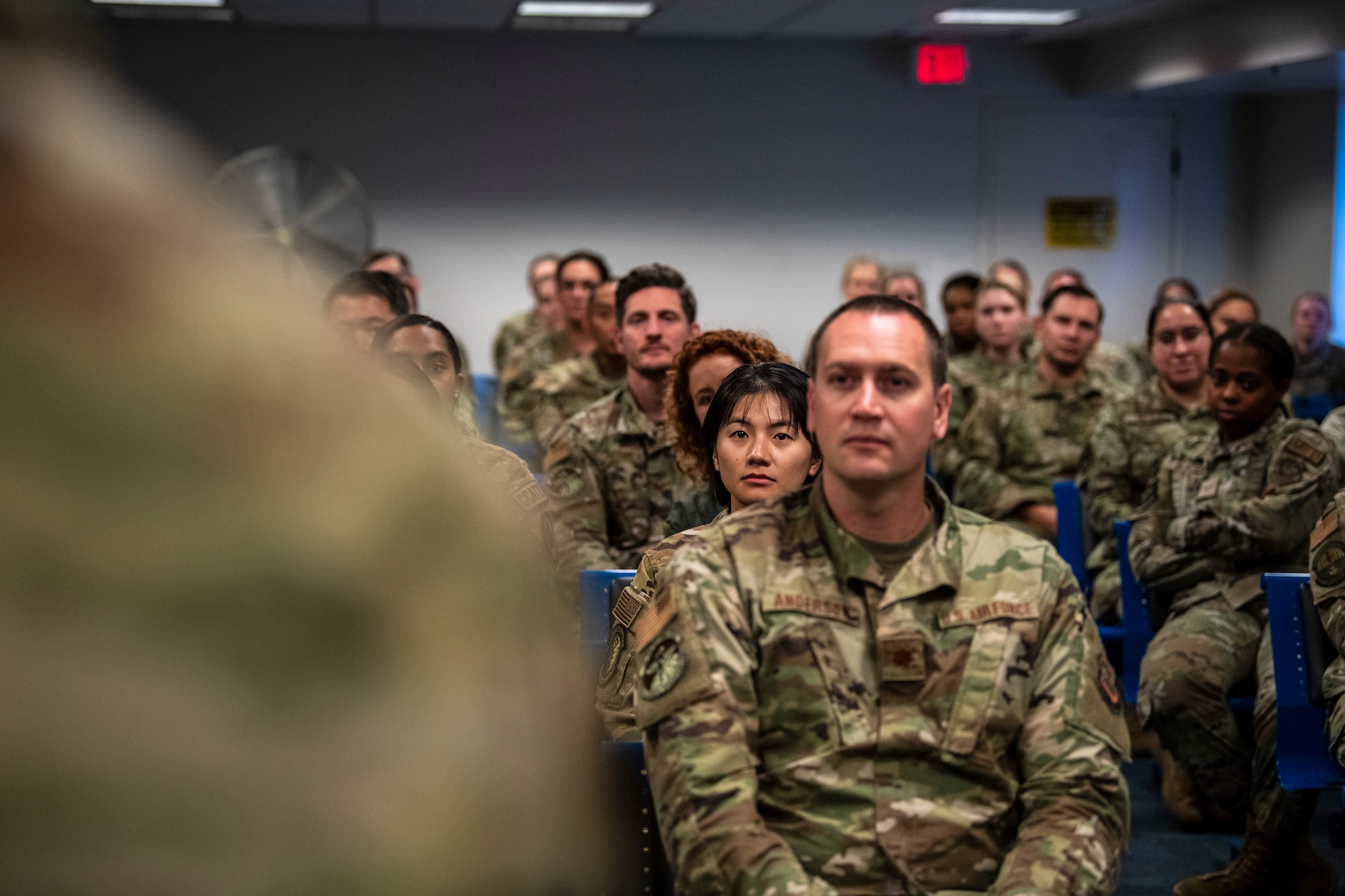 Airmen listen to briefing