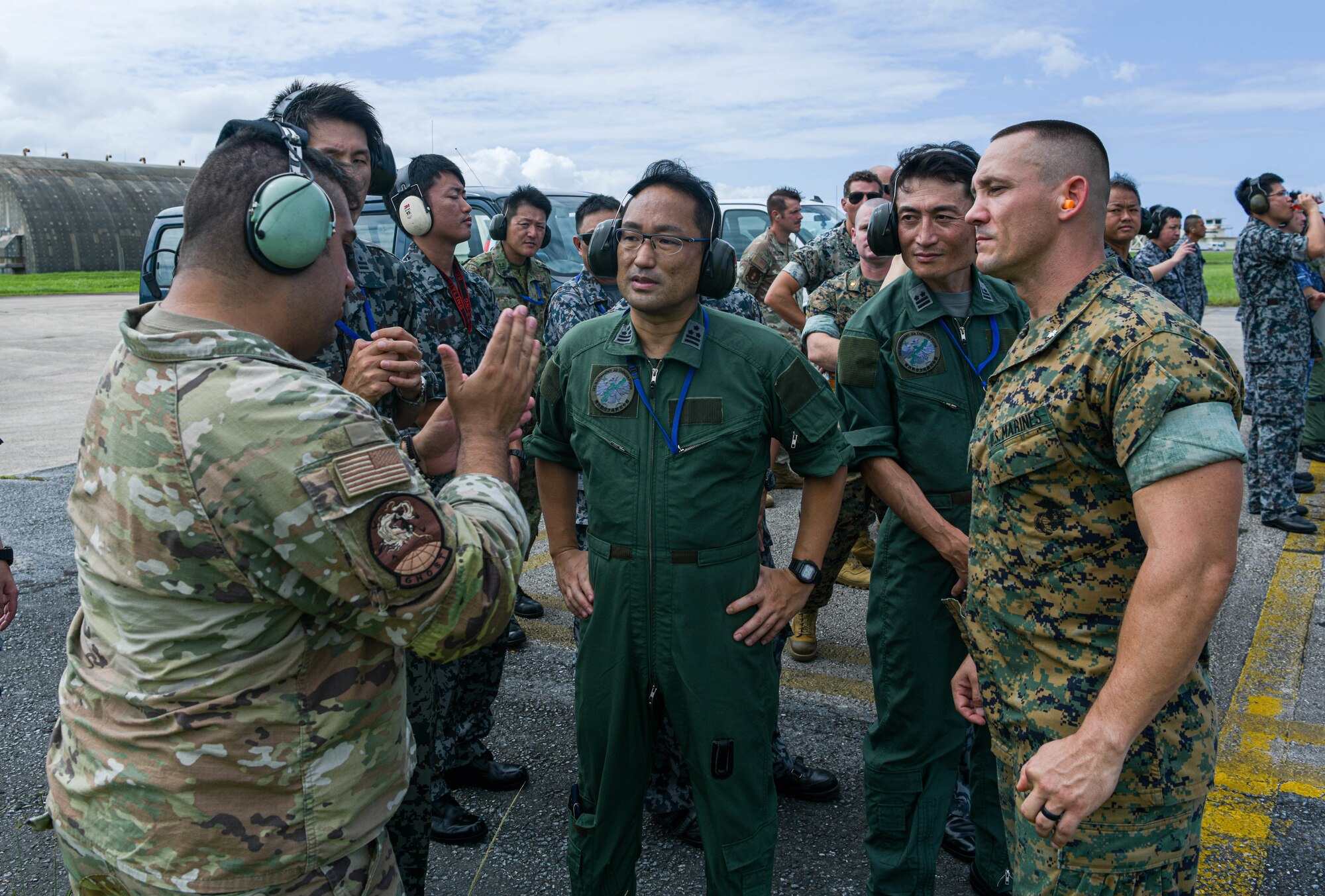 People participate in a bilateral meeting.