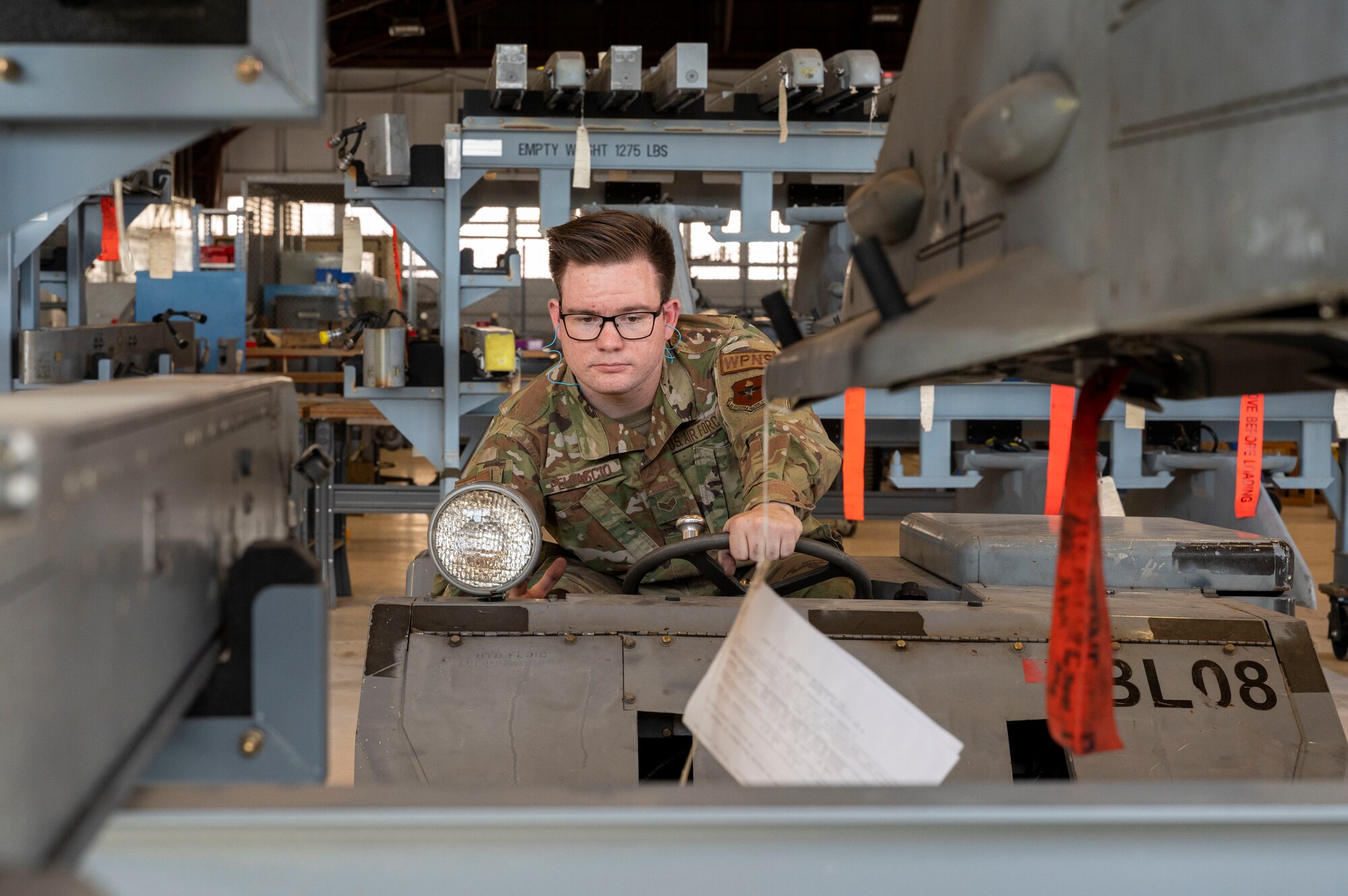 U.S. Air Force Senior Airman Stephen Pellascio, 49th Equipment Maintenance Squadron load crew technician, operates an MJ-1C at Holloman Air Force Base, New Mexico, Oct. 10, 2023.