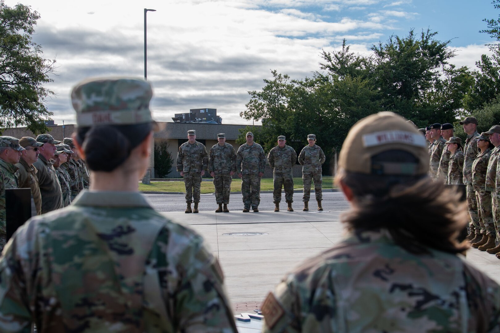 a group of Airmen stand in formation
