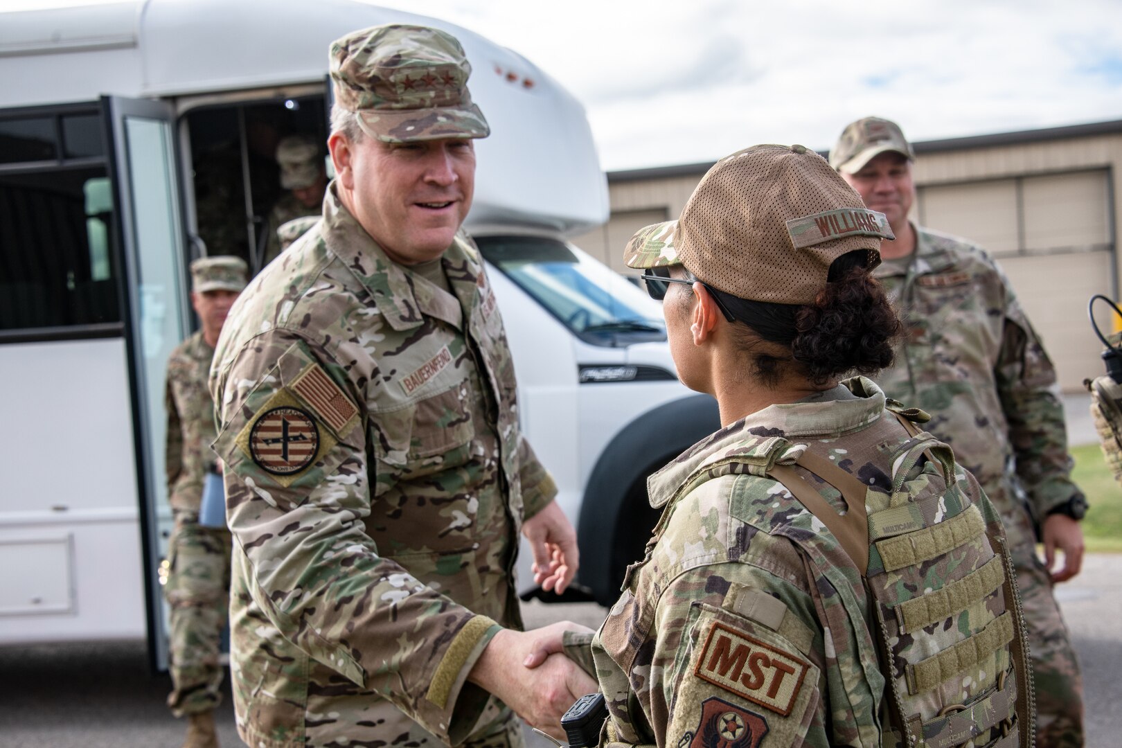 Airmen shake hands