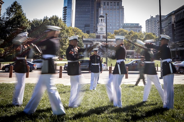 U.S. Marines with the Silent Drill Platoon, Marine Barracks Washington, perform for the citizens of Philadelphia during Navy-Marine Week Philadelphia at Independence Hall, Philadelphia, P.A. on October 12, 2023. Marines are participating in numerous events throughout the city of Philadelphia to increase awareness and establish lasting relationships with communities throughout the area.