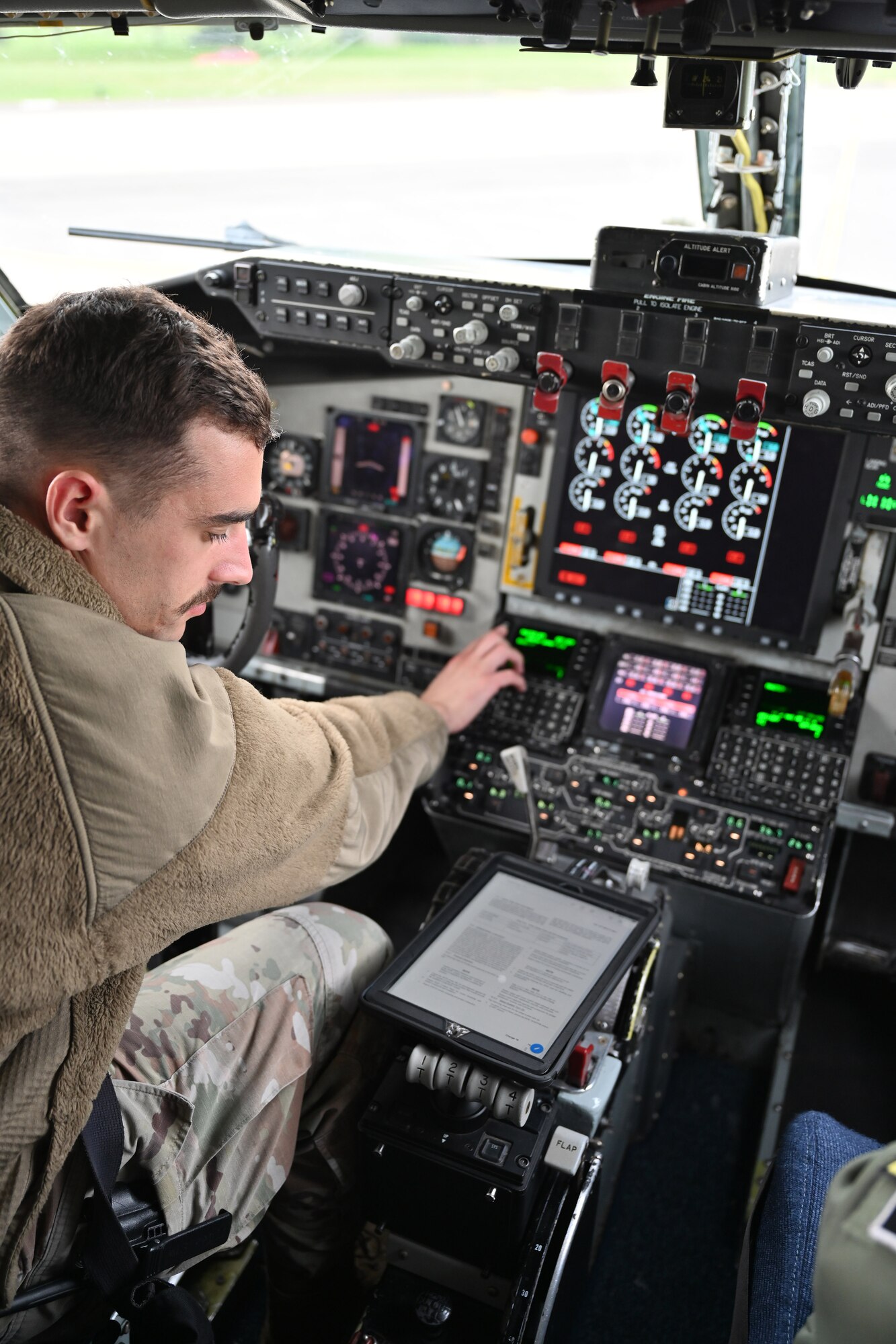 U.S. Air Force Tech. Sgt. Richard Sweeten, 100th Aircraft Maintenance Squadron NCO in charge of avionics, performs systems and operational checks while troubleshooting the Real-Time Information in the Cockpit system (more commonly known as “RTIC”) on a KC-135 Stratotanker at Royal Air Force Mildenhall, England, Oct. 18, 2023. The newly installed communications system gives aircrew the ability to access vital information including threats, target data and locations of friendly forces, providing even more accurate and instant information. (U.S. Air Force photo by Karen Abeyasekere)